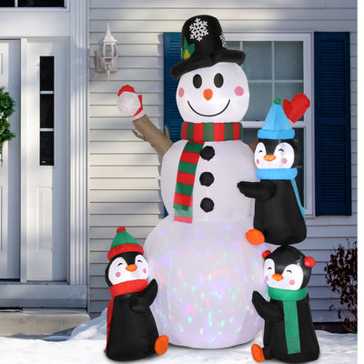 6 Ft. Christmas Snowman Inflatables Outdoor Decoration with 3 Penguins, 4 Light Strings and 1 Colorful Rotating Light - Seasonal Spectra