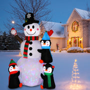 6 Ft. Christmas Snowman Inflatables Outdoor Decoration with 3 Penguins, 4 Light Strings and 1 Colorful Rotating Light - Seasonal Spectra